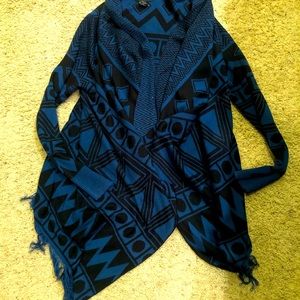 Black and blue cardigan with fringe on the bottom Size S